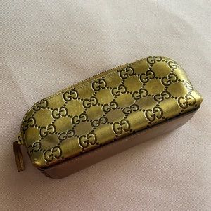 Authenic Gucci Metallic Leather Cosmetic Pouch